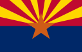 Flag of the Arizona Rangers. A bisected flag, with a dark blue bottom half and Red and Yellow Rays on the top half diverging from a central gold star.